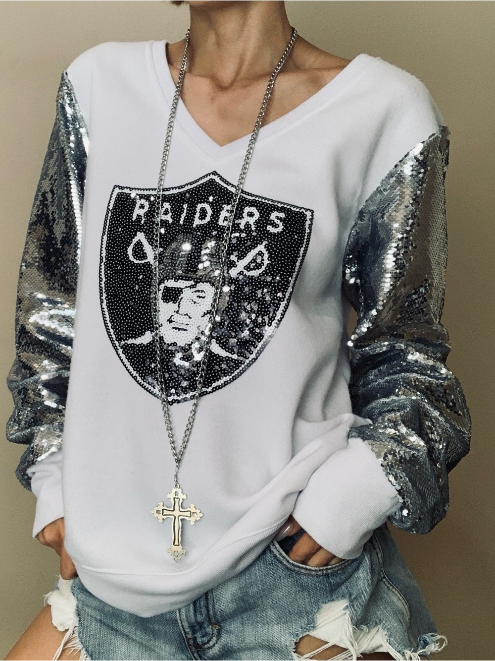 White Sequin-Sleeve Raiders Logo V-Neck Sweatshirt